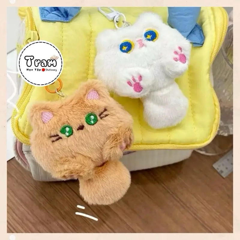 Móc khóa sóc bông trang trí màu trắng và nâu treo balo vàng