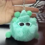 Biến thể móc khoá tiểu yêu bông xù màu xanh mint mint